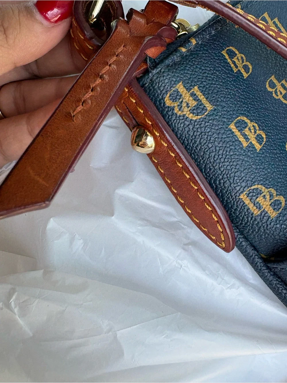 Dooney & Bourke navy with Brown Trim Monogram Crossbody